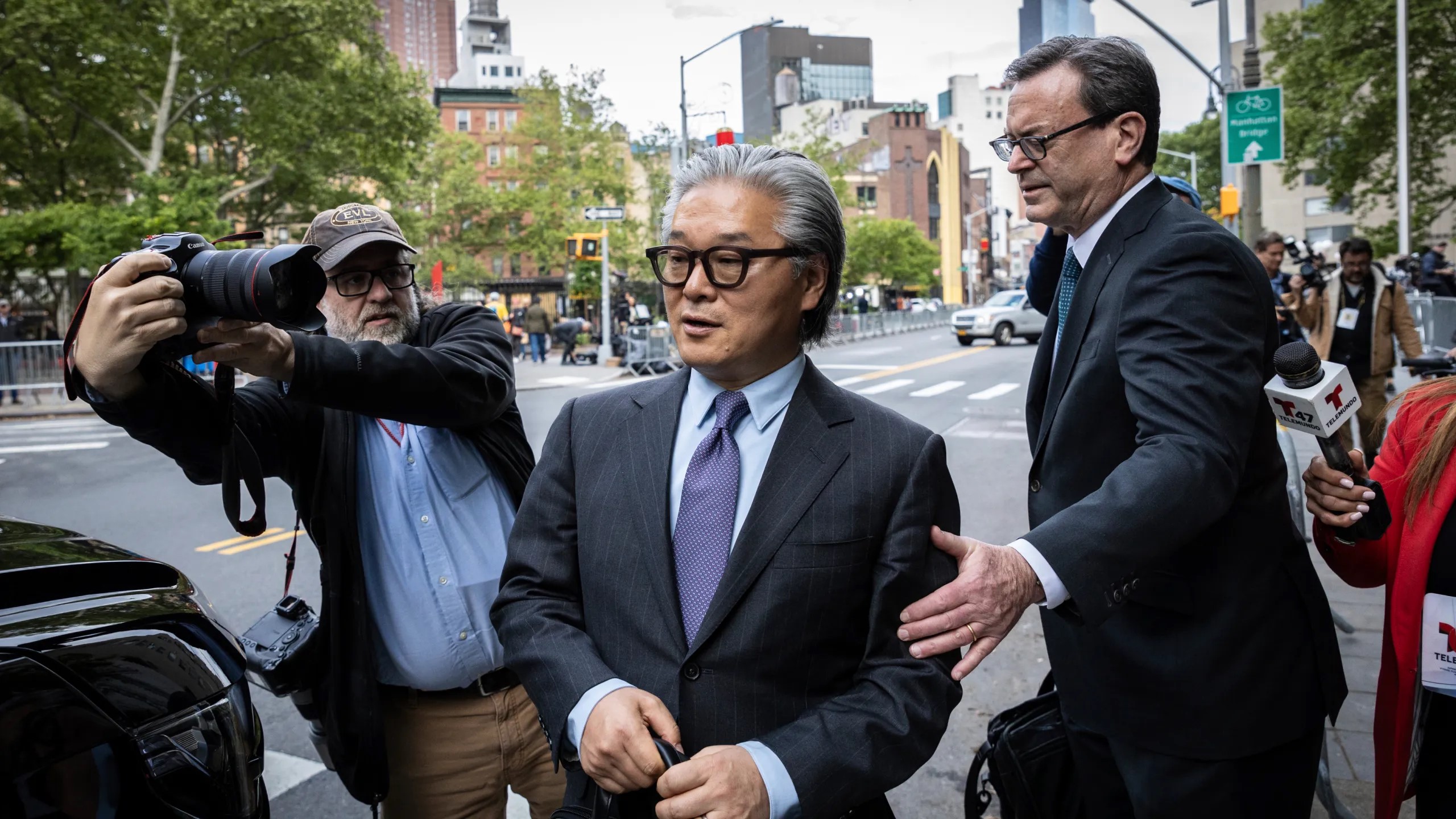 Bill Hwang, founder of Archegos Capital Management, exits Manhattan federal court after the first day of his corruption trial on Monday, May 13, 2024 

Image Source: KARK 